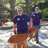 Hallmark volunteers help at Kansas City's "Wild Day at the Zoo" volunteer activity.