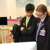 Students learning from Hallmark UK employees