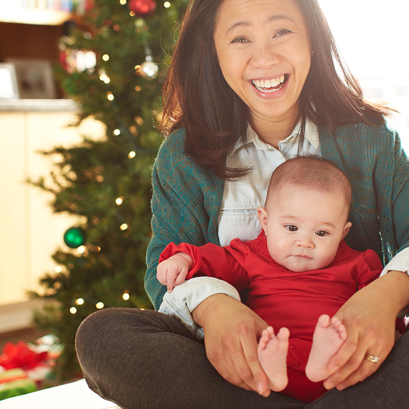 Woman with baby at Christmas