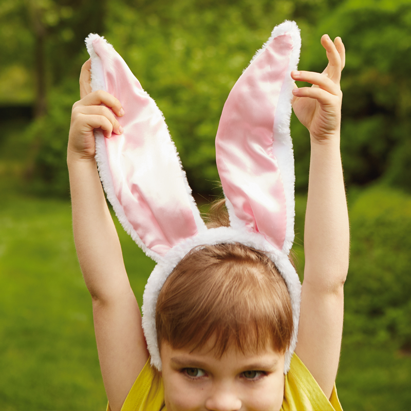 Child with bunny ears