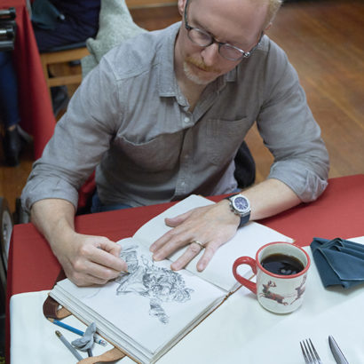 Hallmark Cards’ master artist and illustrator, Geoff Greenleaf on set working on an illustration