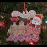 2018 Mayor’s Christmas Tree Ornament Santa Riding a Train Hanging On a Tree