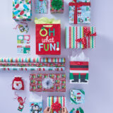 Assortment of holiday gift bags and wrapping paper