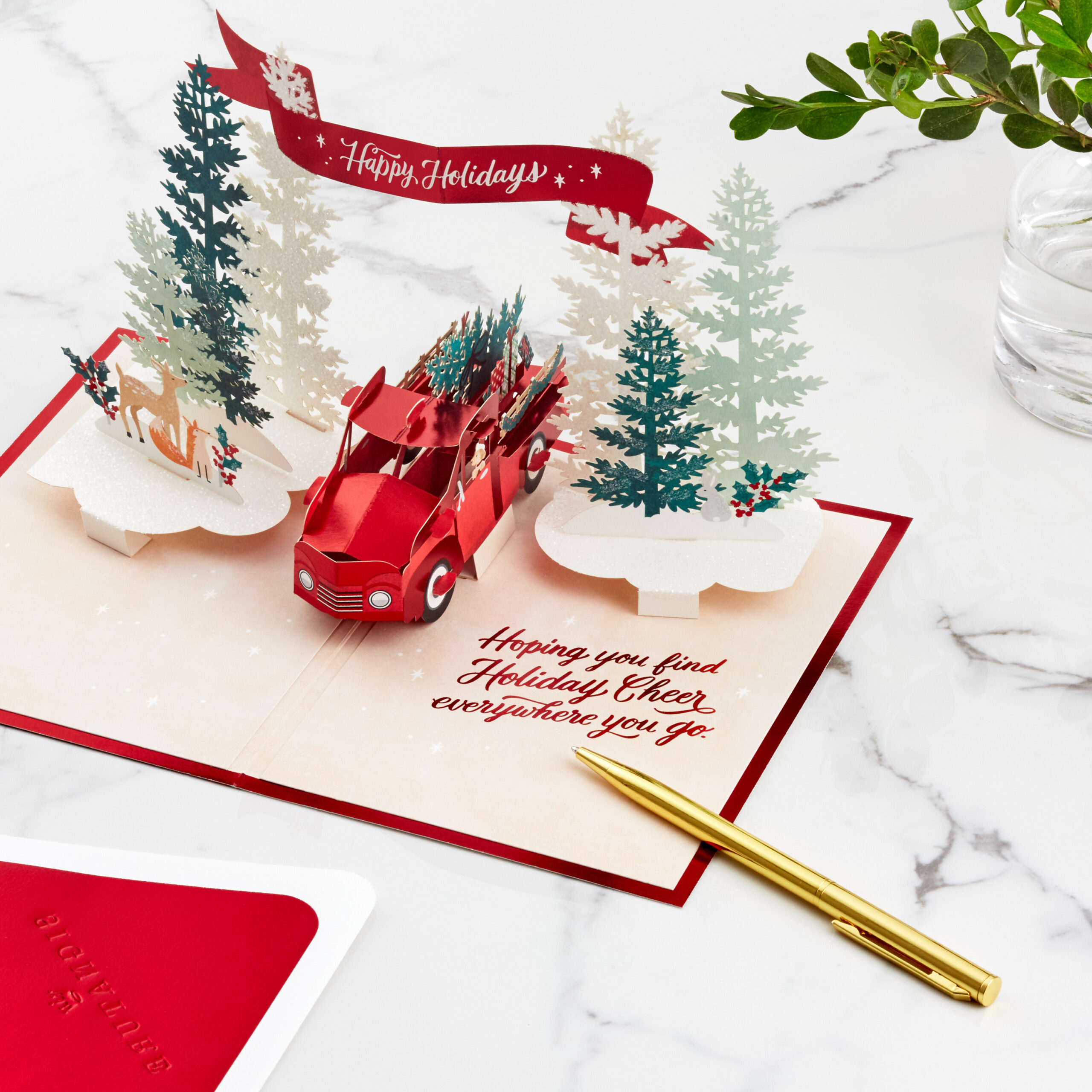 Hallmark 3D holiday cheer card with pop-up trees, animals, and a vintage red truck
