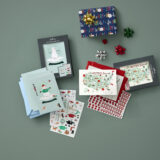 Hallmark Holiday Greetings cards, gift wrap, and sticker card kits.